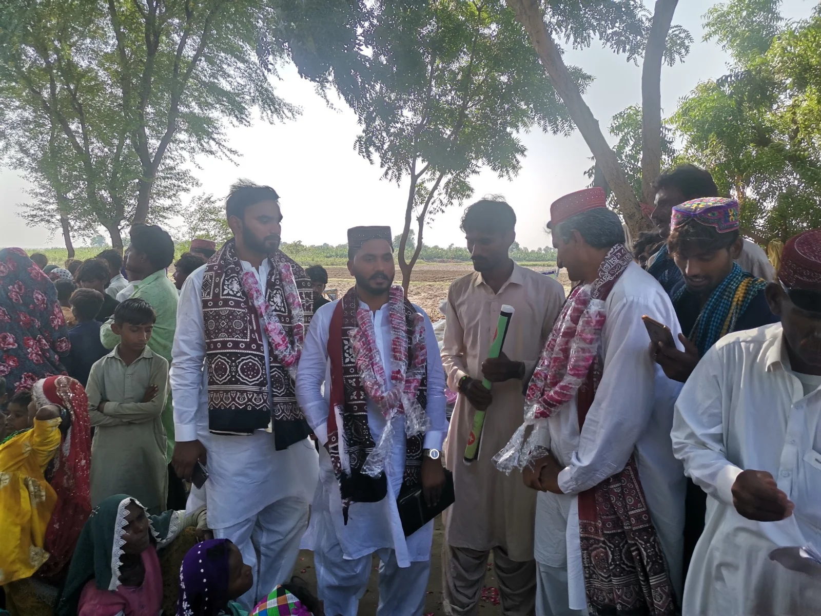 Volunteers smiling during outreach