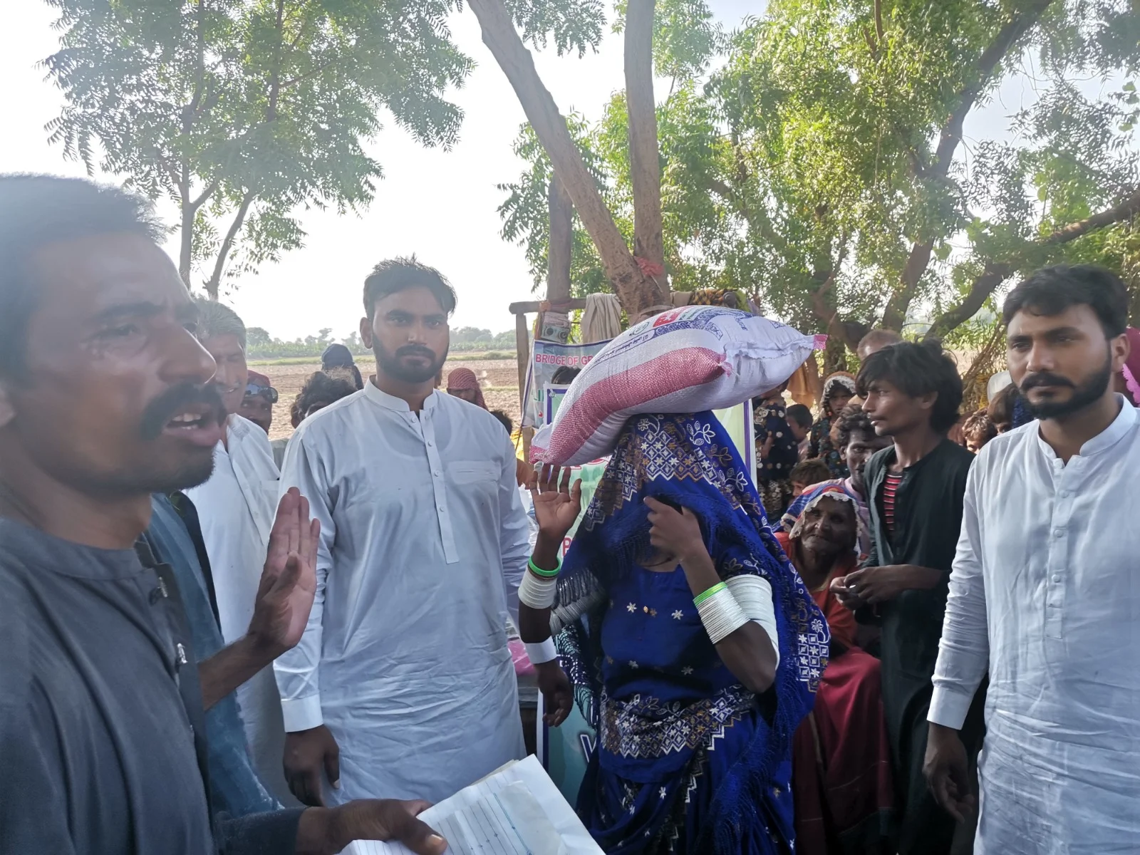 Volunteers distributing aid to community members